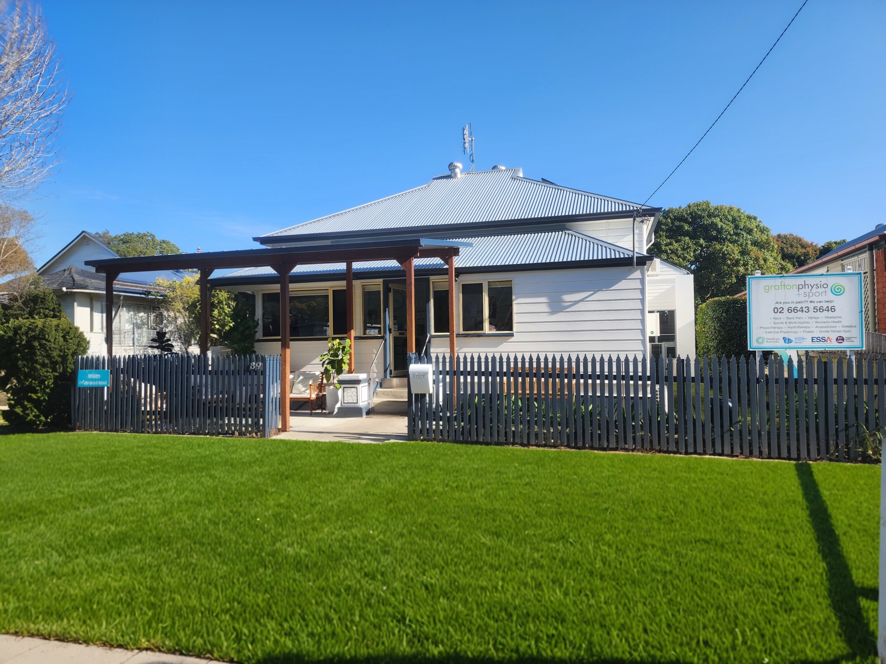 The Grafton Physio + Sport clinic, a white weatherboard cottage at 89 Alice Street, Grafton