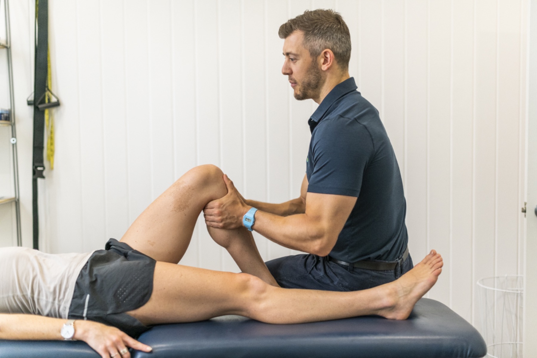 A physiotherapist treating a patient on the plinth at Grafton Physio + Sport